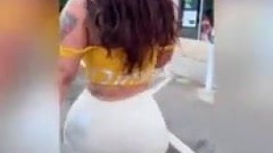 Crazy latina with BIG BOOTY showing her assets around