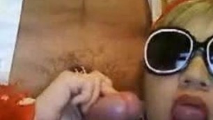 girl sucks big cock on webcam