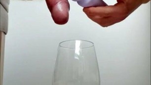 Cum by vibrator in glass